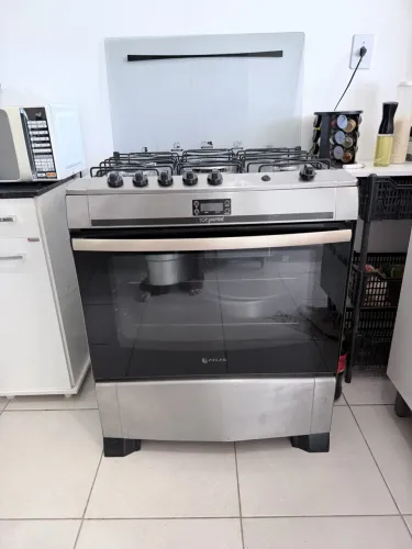 Fogão Atlas Top Gourmet, 5 bocas, acabamento em inox, com forno. 