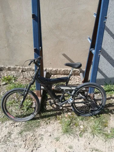 Bicicleta ? aro 20 com mola cor: preta