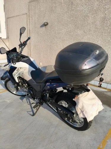 Moto com 5 anos de uso, Modelo Dafra NH190, azul e branca com 99.900 KM rodado.