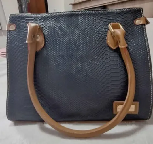 Bolsa de couro Mônica Sanches