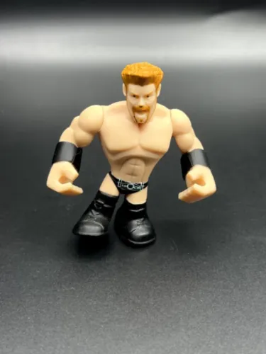 BONECO MINIATURA MATTEL WWE RUMBLERS SHEAMUS 7CM