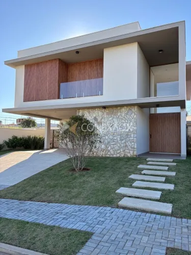 Casa para venda em condomínio, com 4 suítes, espaço gourmet e quintal com piscina em Campi