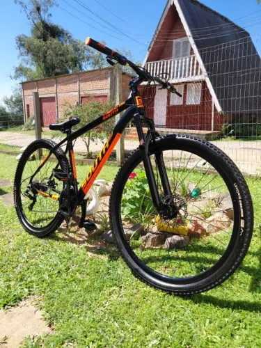 South Storm Aro 29 Preta/Laranja + Alumínio + Shimano