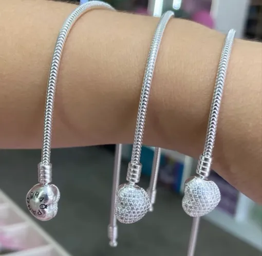 Pulseira modelo Pandora + 2 berloques