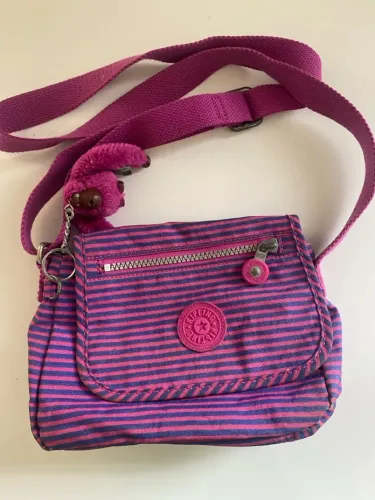 Bolsa Kipling rosa listrada como nova
