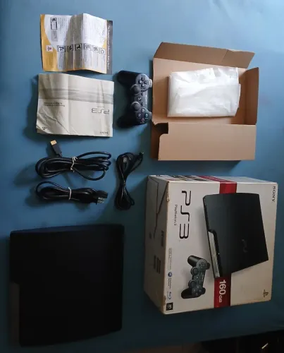 Ps3 Slim + caixa, manuais, controle e cabos originais