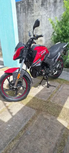 Moto revisada e emplacada 100% 2026 só transferir. 