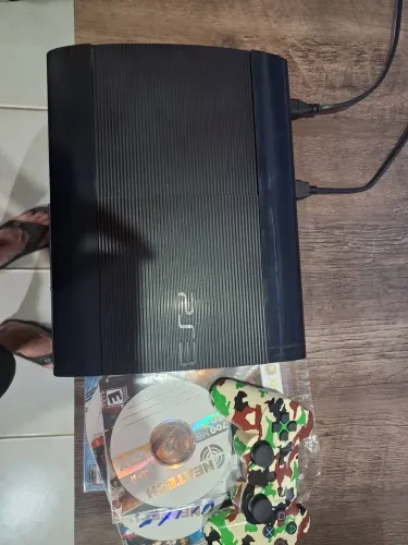 PS3 SUPER SLIM DESBLOQUEADO COM CONTROLE NOVO HD 500 GIGAS LOTADO DE JOGOS GARANTIA..