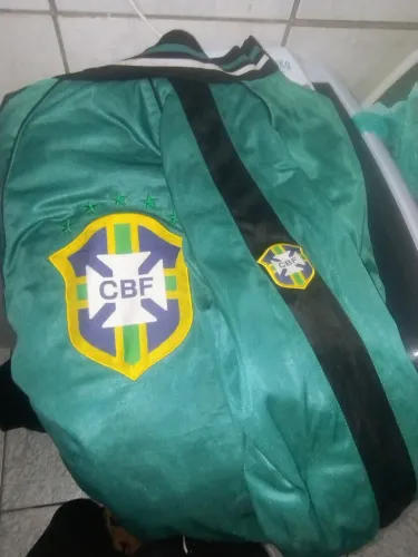 Casaco antigo da seleção brasileira dupla face .