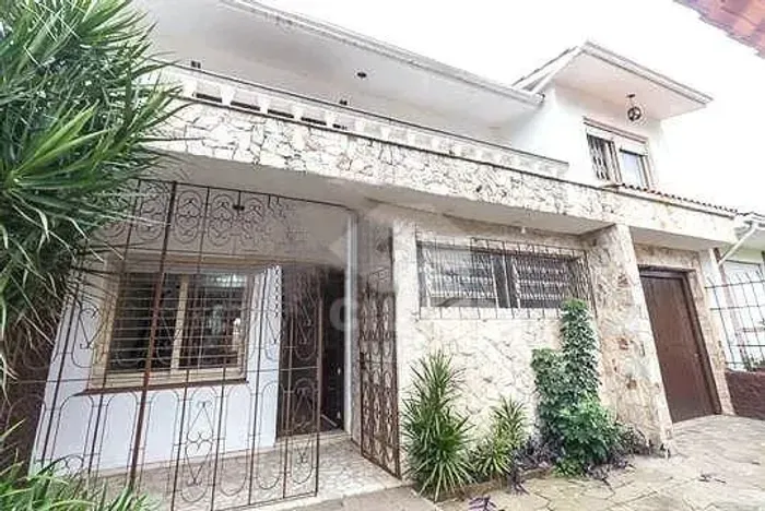 Casa com 4 dormitórios para alugar, 300 m² por R$ 7.347,00/mês - Três Figueiras - Porto Al