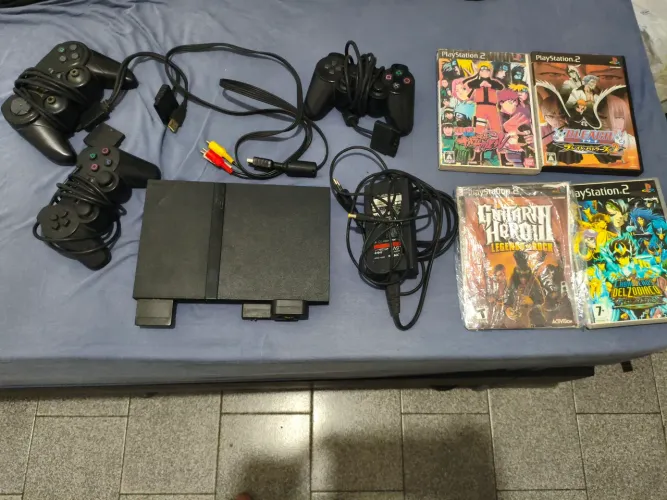 Playstation 2 slim Matrix (usado) com mal contanto na imagem e no leitor de disco