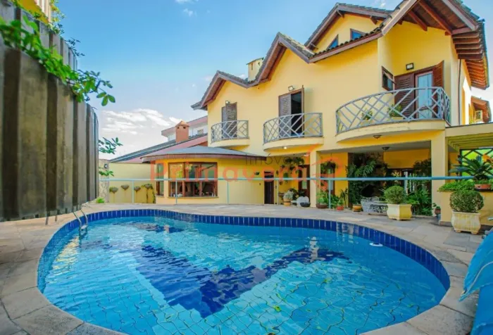 Casa de condomínio de alto padrão à venda no City América com 450m, 4 suítes, 4 vagas e pi