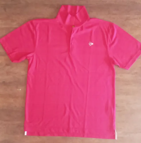 Camisa polo Dunlop Sport.