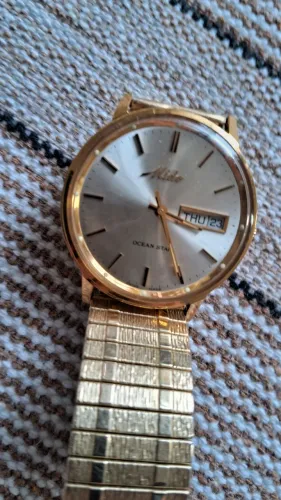 Relogio mido ocean star dourado