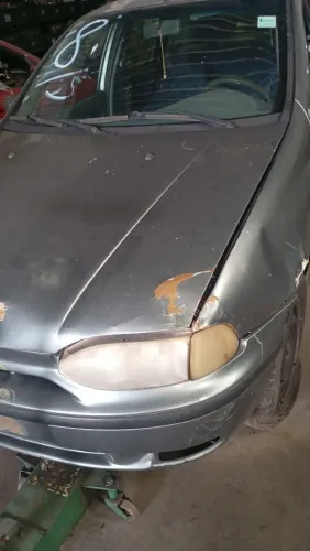 Farol foco simples lado esquerdo Palio 98