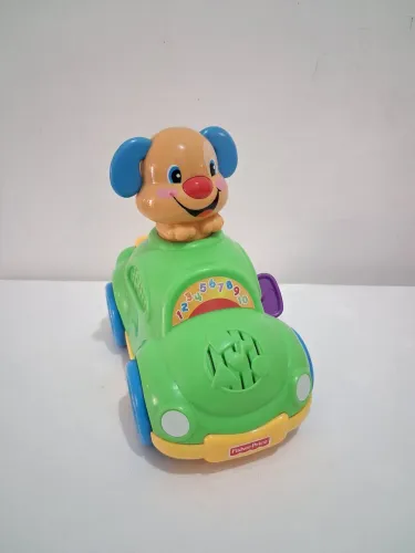 Carrinho musical Fisher Price em ótimo estado 
