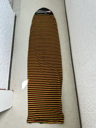 Capa de prancha Banana Wax listrada reggae - ótimo estado