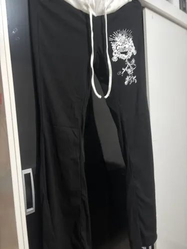  Calça Flare Feminina com Estampa Floral Retrô em Recortes Coloridos
