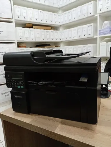 Impressora HP LaserJet M1212nf MFP