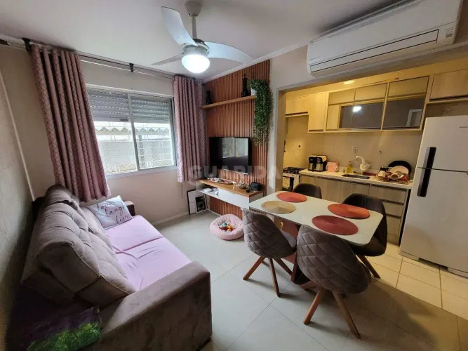 Apartamento térreo com 1 dormitório e 1 vaga de garagem no bairro Cristal