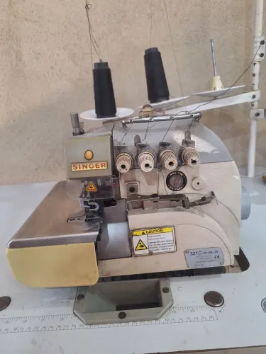 Máquina interlock industrial singer