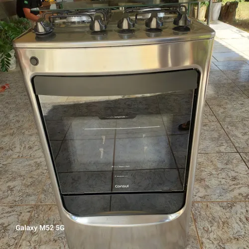 Fogão consul inox 4 bocas elétrico semi novo.