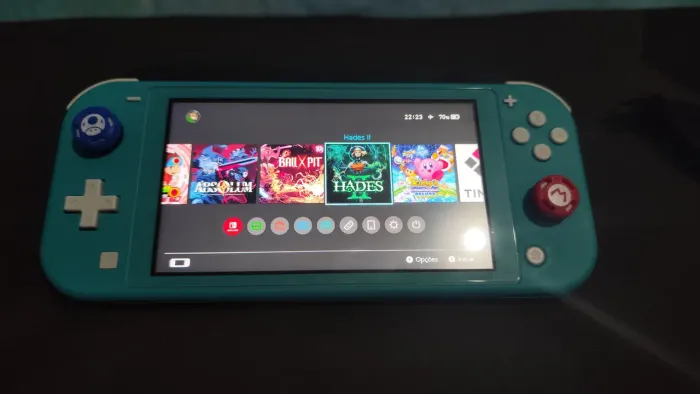 Nintendo Switch Lite + SD 256GB | Edição Definitiva (Zelda, Mario, Pokémon, Hades 2)