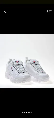 Tenis fila branco semi novo! Uso casual!