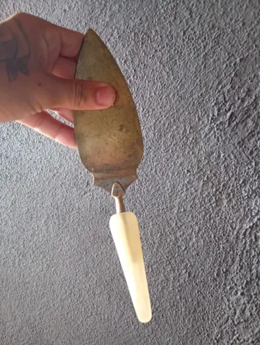 Espátula de bolo de metal antigo