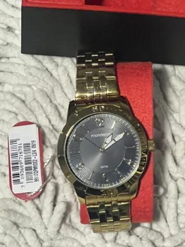 Relógio mondaine masculino dourado original