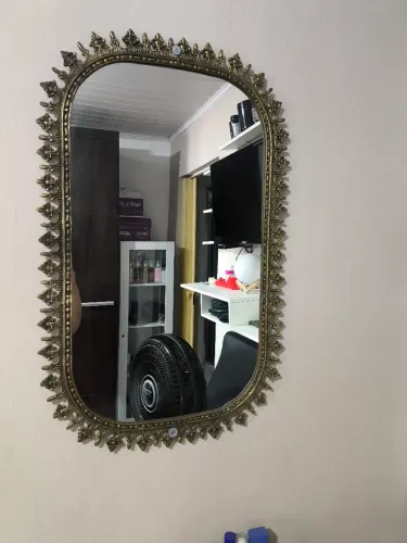 Espelho oval moldura de bronze