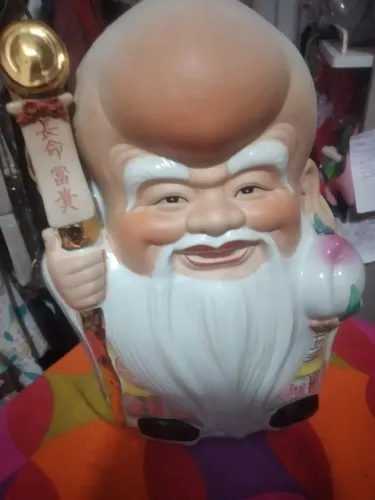 Buda da felicidade de porcelana