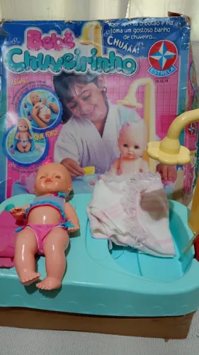 Boneca estrela chuveirinho com roupinha e mantinha muito antiga perfeito estado
