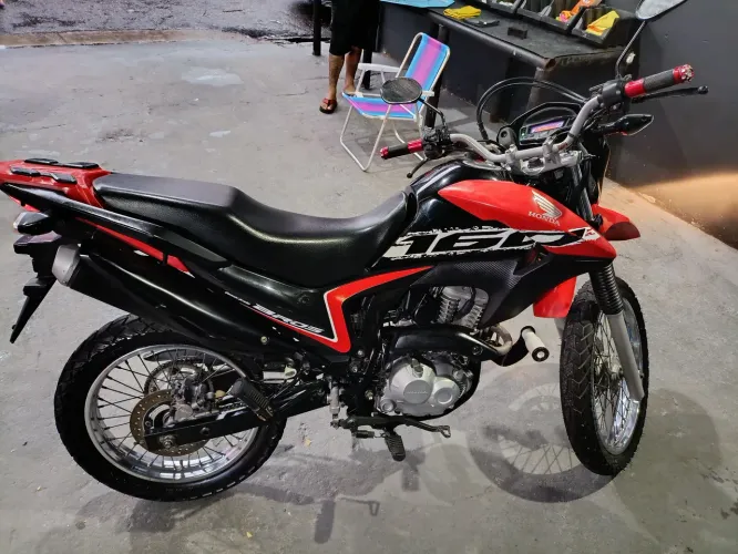 Moto top,quitada e selada.so $16.000
