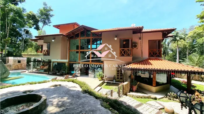 Casa de condomínio para venda tem 700 m² com 6 quartos - Park Imperial Massaguaçu - Caragu