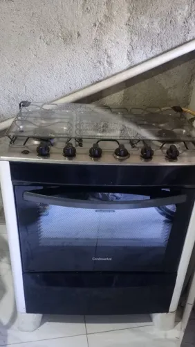 Vendo fogão continental pega pertinho, tem 6 bocas pega 5 bocas normalmente o forno