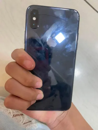 IPHONE X COM PONTINHOS NA TELA