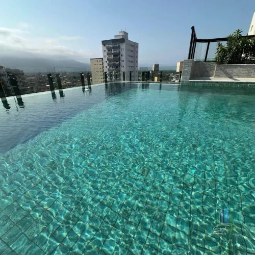 Apartamento com 2 dormitórios à venda, 61 m² por R$ 450.000,00 - Tupi - Praia Grande/SP