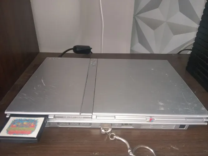 PS2 com 64 jogos 2 controle
