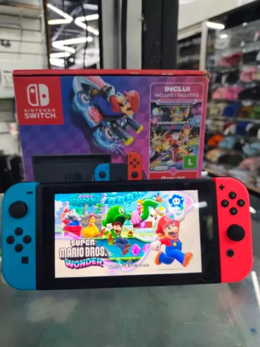 Switch OLED/destravado/cartão 128gb/10 jogos instalados/10 meses garantia