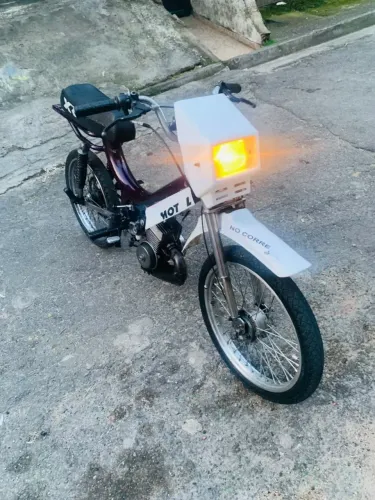 Tou vendendo essa Mobilete 2 tempos 75 toda zera afogador carburador tudo zero toda