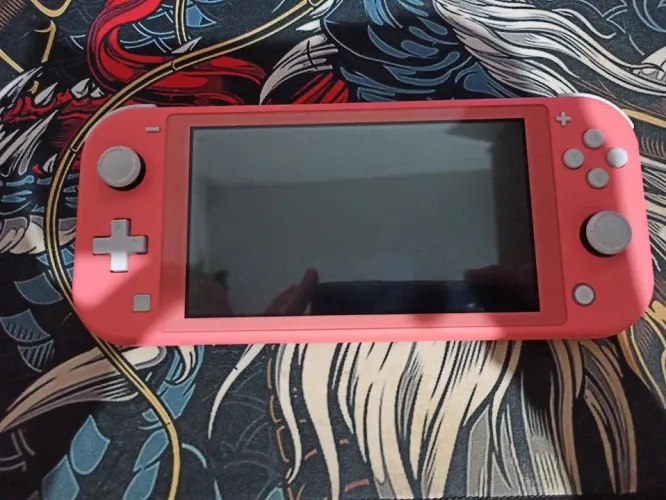 Nintendo Switch lite Coral usado 30gb