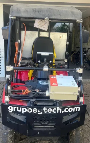 Irrigador para plantação e quadriciclo