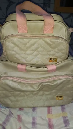 Bolsa usada porém conservada saída da maternidade etc..