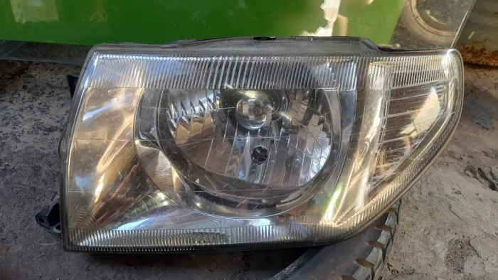 Farol pajero tr4 original 