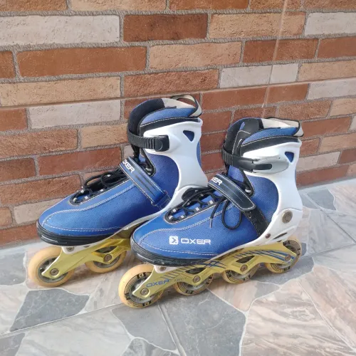 Patins oxer, tamanho 39, com algumas marcas de uso, mas em perfeito estado