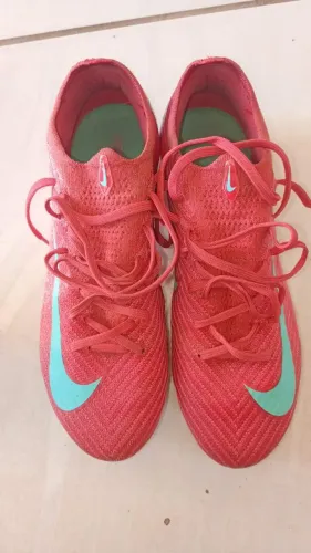 Chuteira da nike rosa mercurial travas de alumínio 
