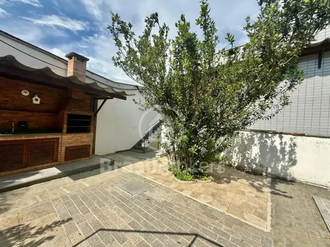 Casa linear no Jardim Guanabara com quintal e área de lazer