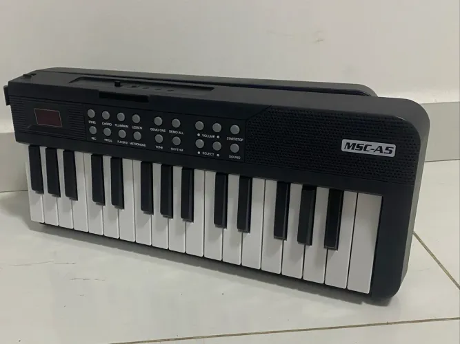 Teclado Dobrável Tomate 61 Teclas com 200 timbres 