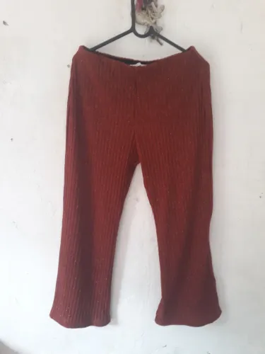 Calça brilhosa tam MG